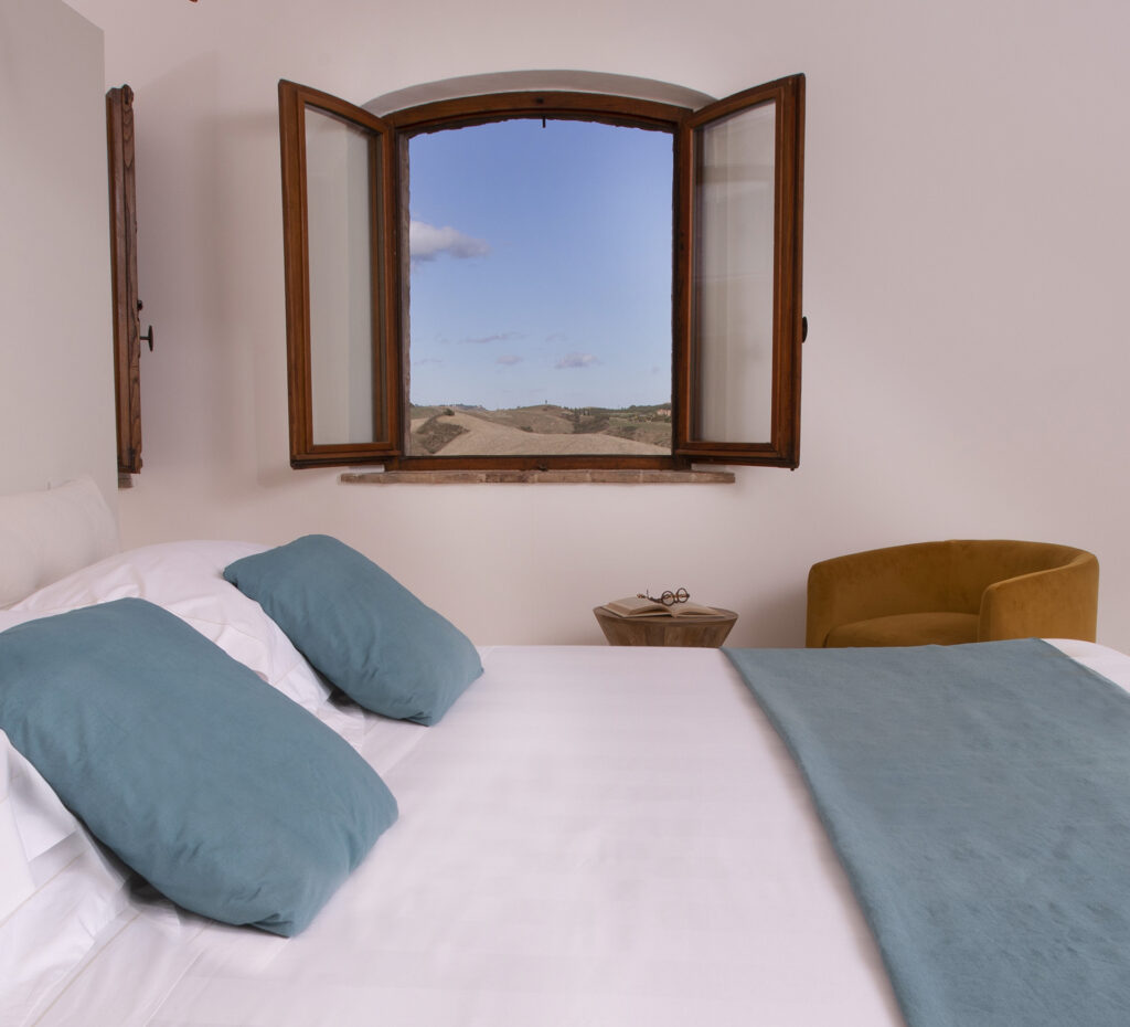 Luxury hotel room in Tuscany with landscape